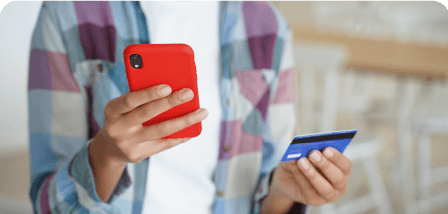 Photo of woman making online payment on mobile