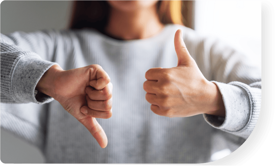 Photo showing thumbs up & down